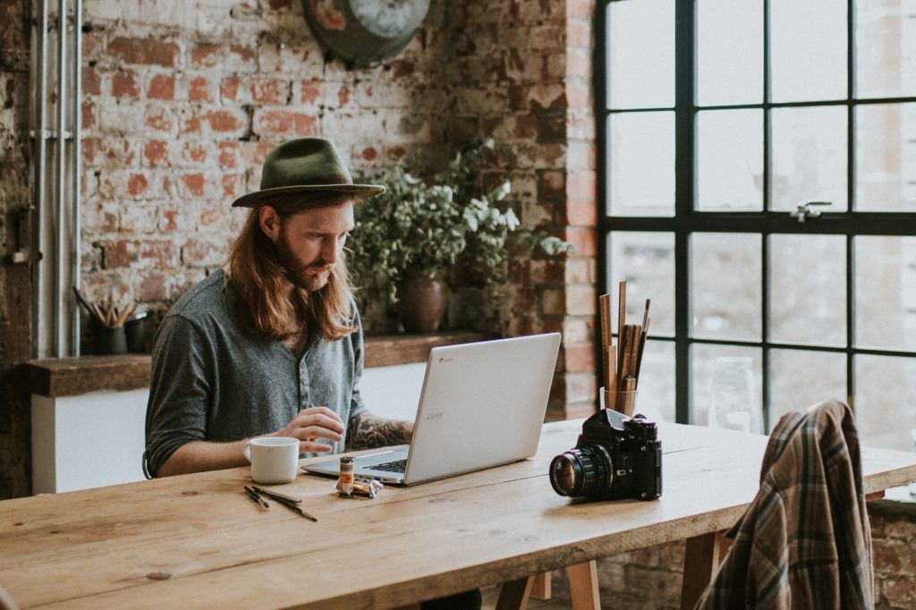 guy writing on comfortable writing space